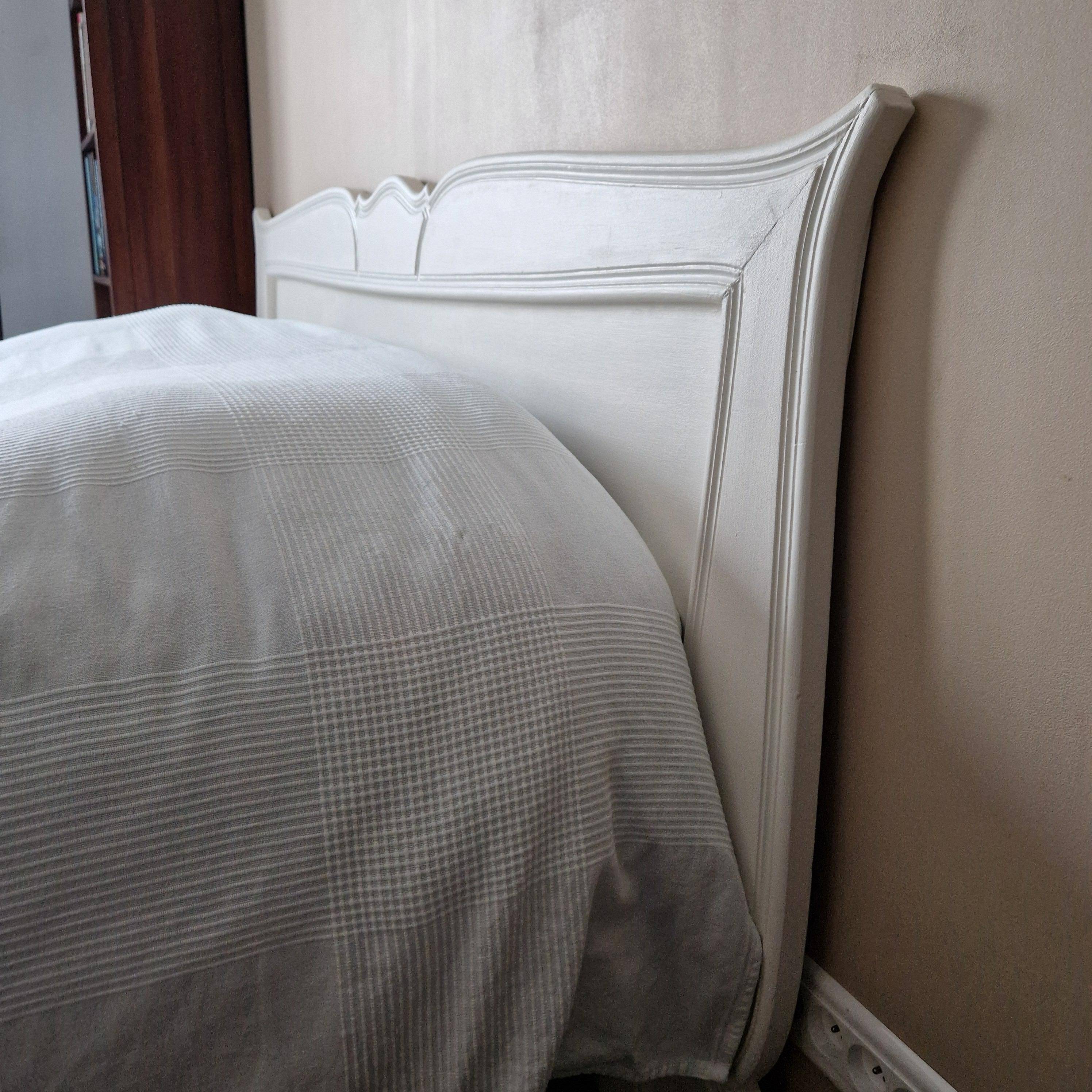 Large antique white wooden headboard, 190 cm wide.