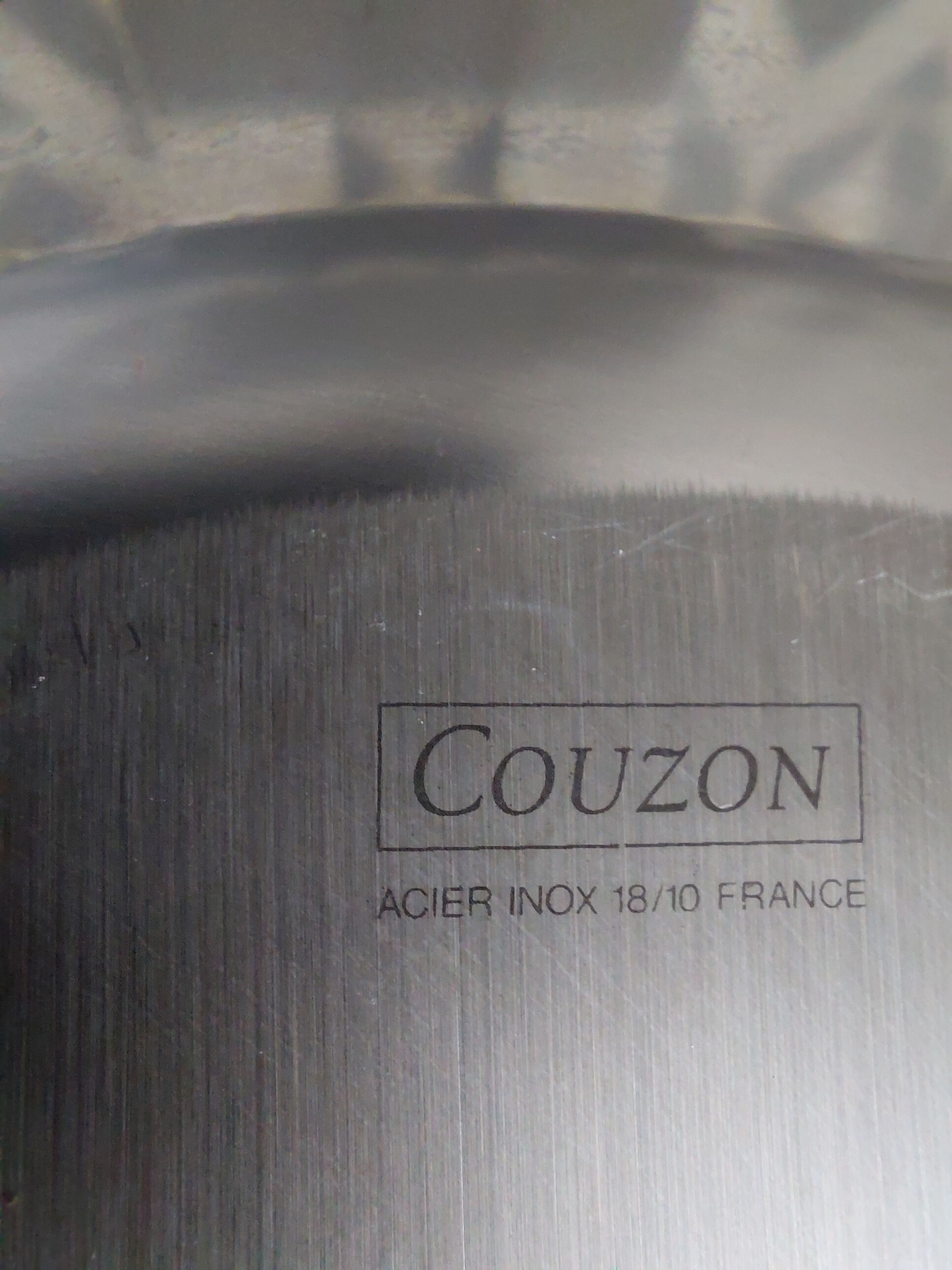Shallow round plate Jean Couzon