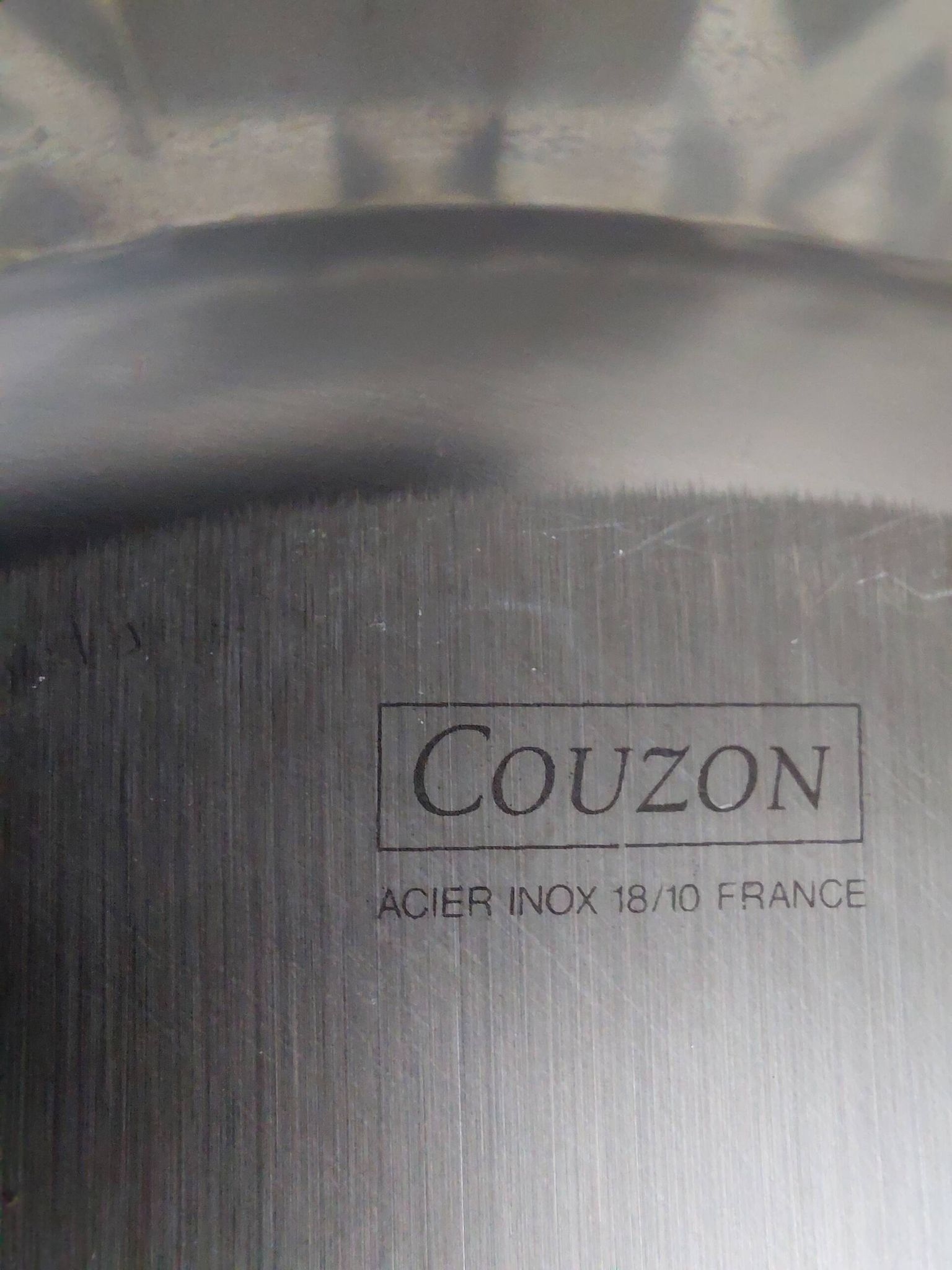 Shallow round plate Jean Couzon