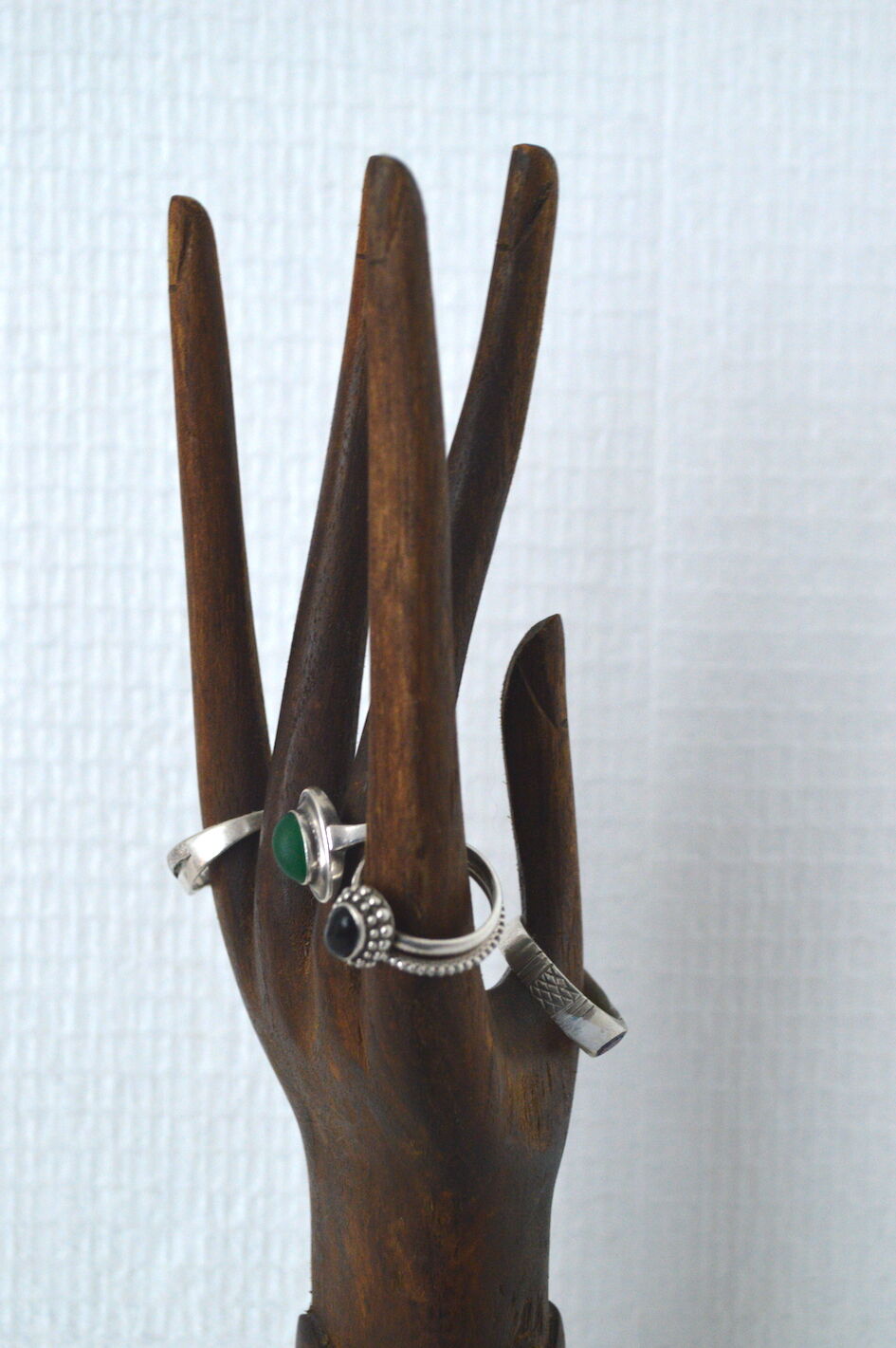 Carved wooden baguier hand