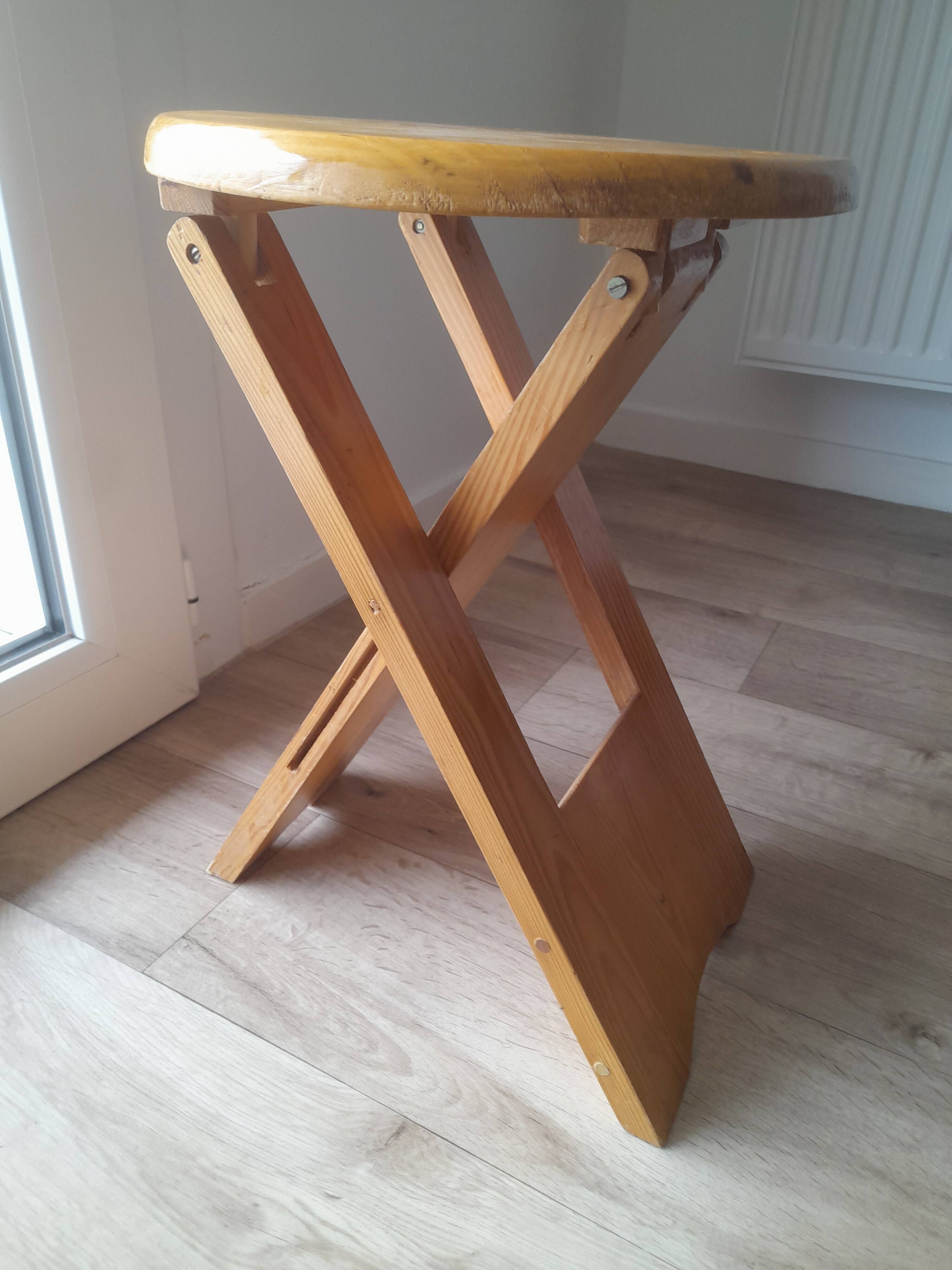 Folding wooden stool by Roger Tallon from the 1970s.