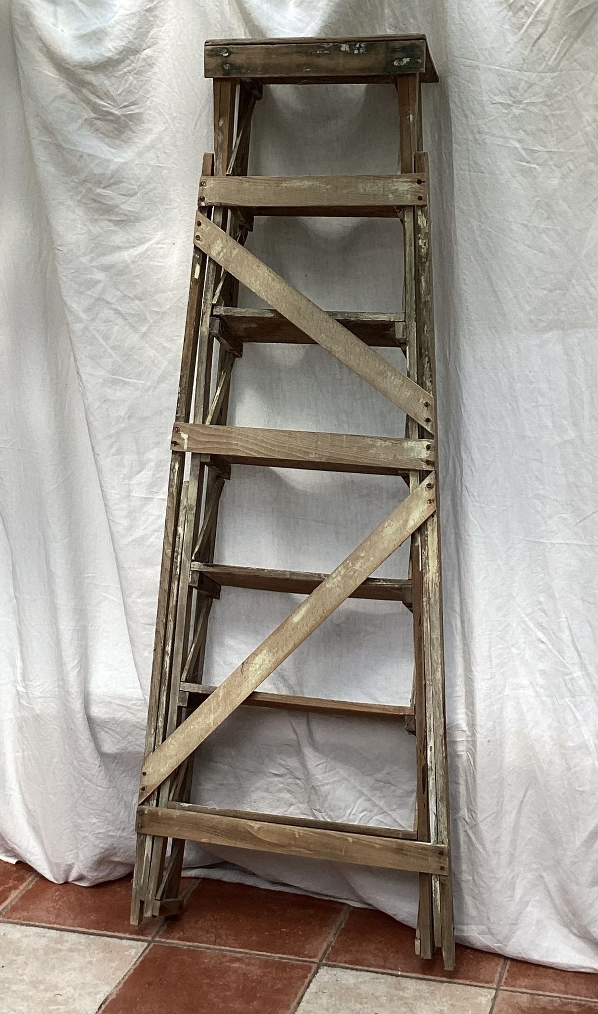 Wooden painter's stepladder in the middle of XX century foldable