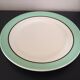 12 service plates and 1 green plate mint