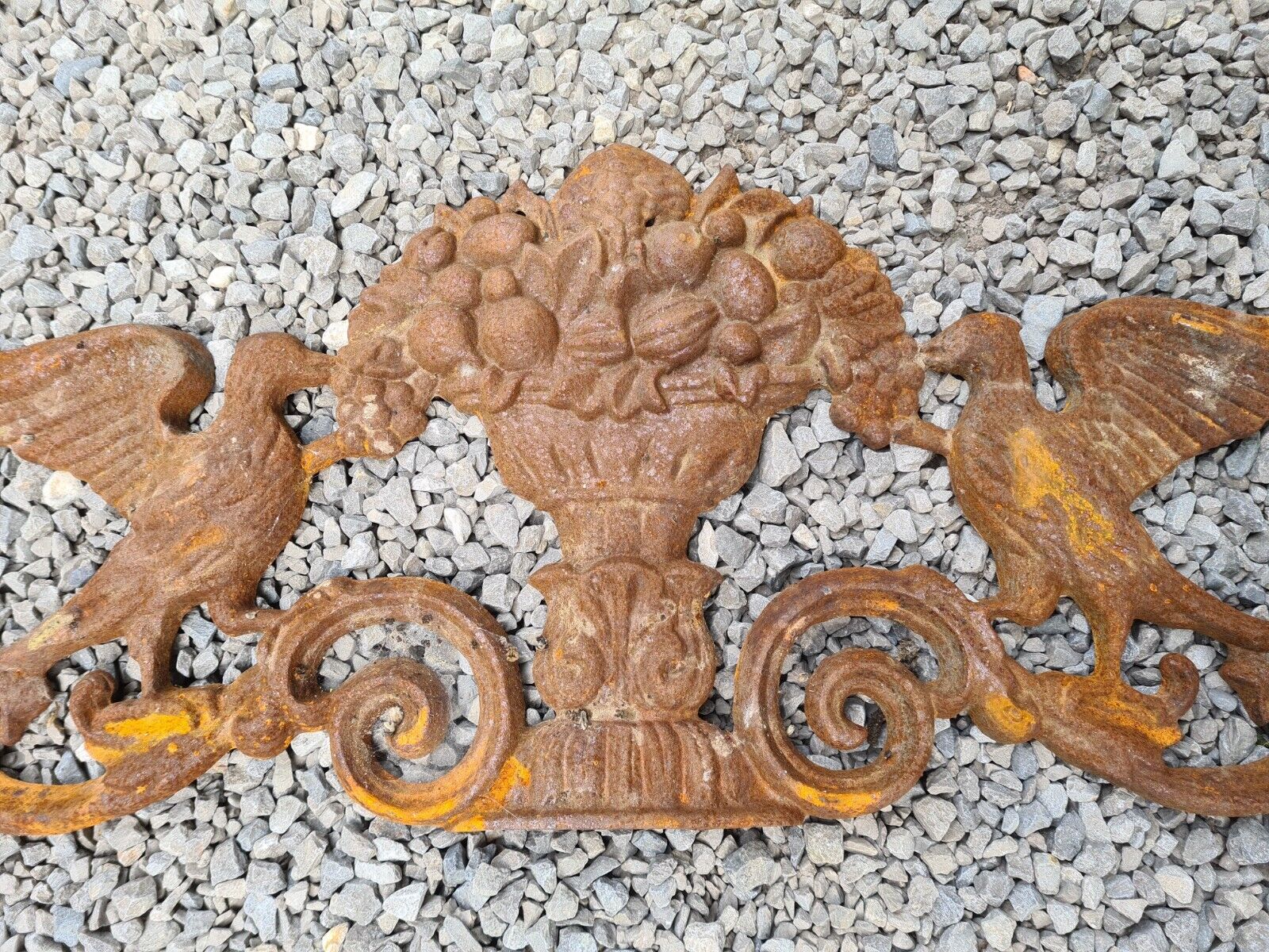 Cast iron pediment with birds