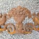 Cast iron pediment with birds