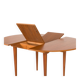Scandinavian round teak table with hidden extension, 1970s