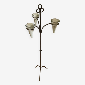 Tall iron and glass candle holder