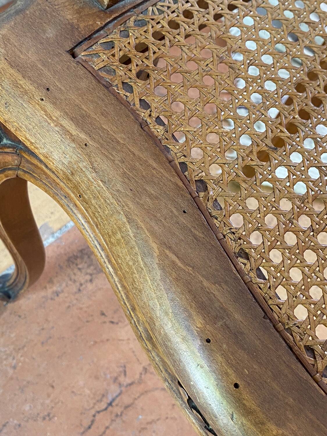 Louis XV style caned armchair