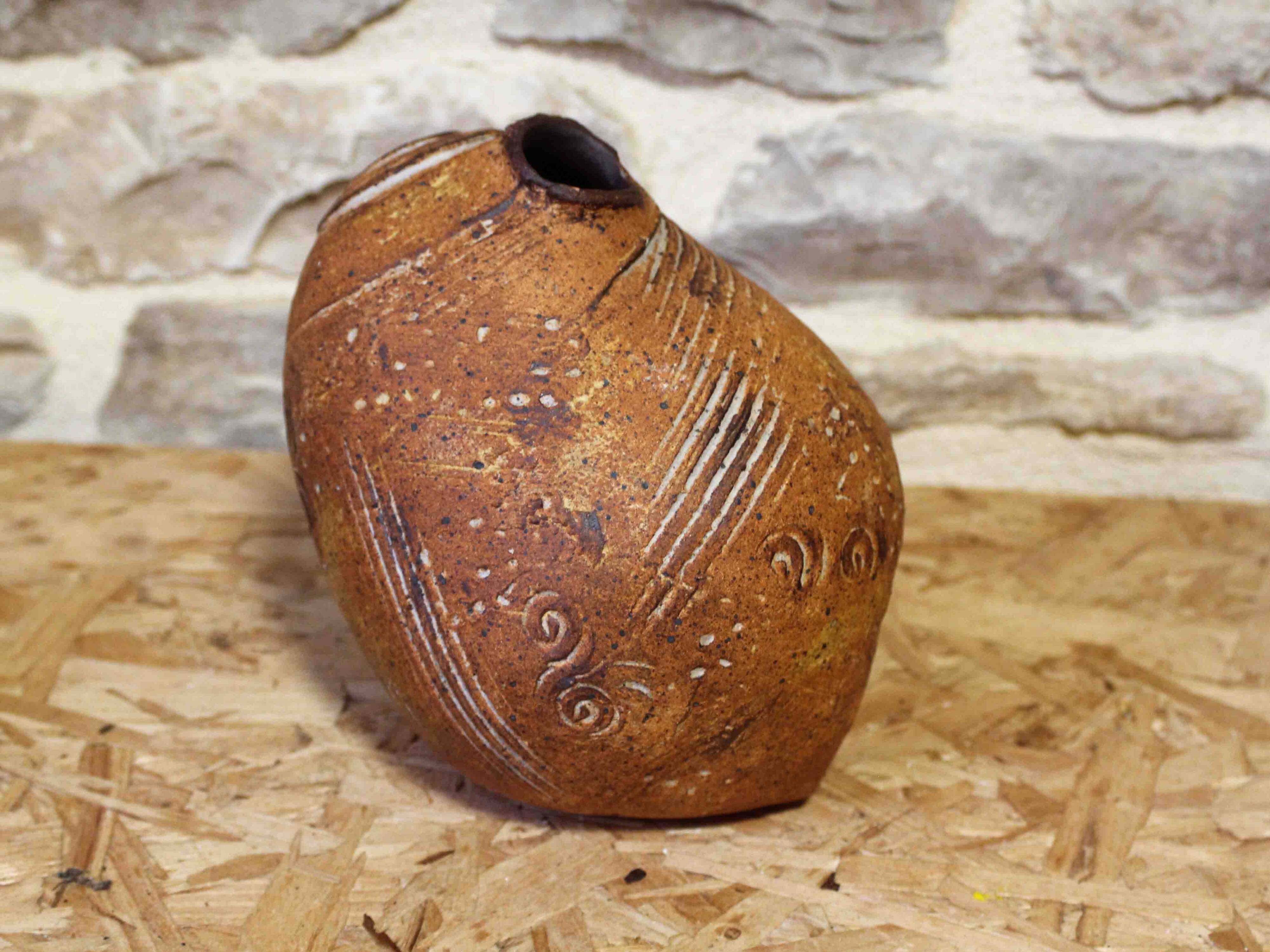 Stoneware vase with incised decoration