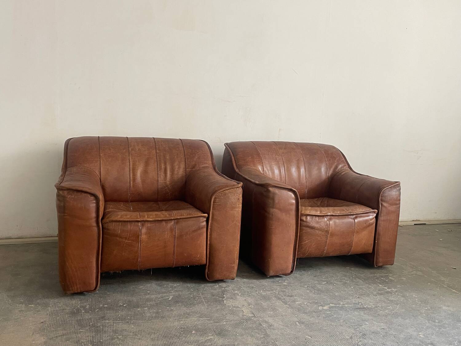 Pair of leather armchairs