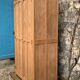 Parisian paneled cabinet in raw wood, 1940