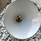 Enamelled sheet metal cone suspension