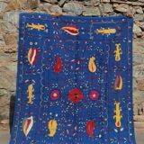 Midnight blue suzani kilim rug with embroidered patterns