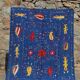 Midnight blue suzani kilim rug with embroidered patterns
