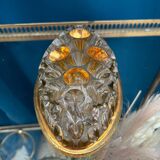 Pique fleurs ovale verre moulé doré XXe