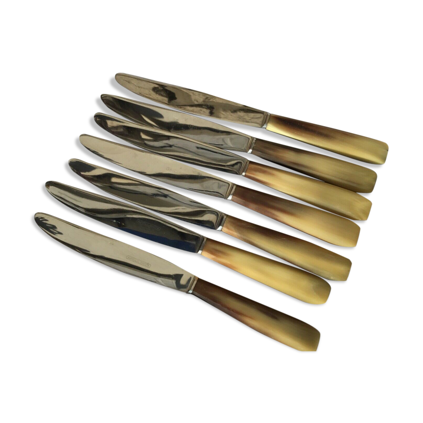 Lot 7 fruit knives or apolonox cow horn entremet