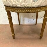 Paire de chaises de style Louis XVI en bois doré XX siècle