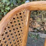 Pair of rattan and canning armchairs