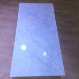 Coffee table with steel tube structure and marble top