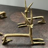 7 portes couteaux « antilopes » anciens en laiton