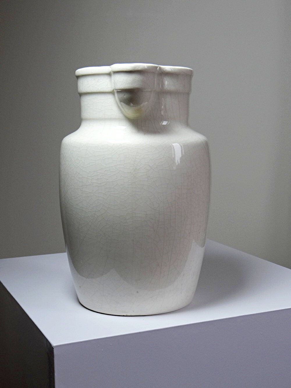 Large Art Deco toilet bowl, antique cracked faience.