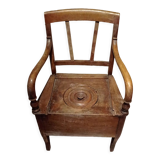 Chaise percée