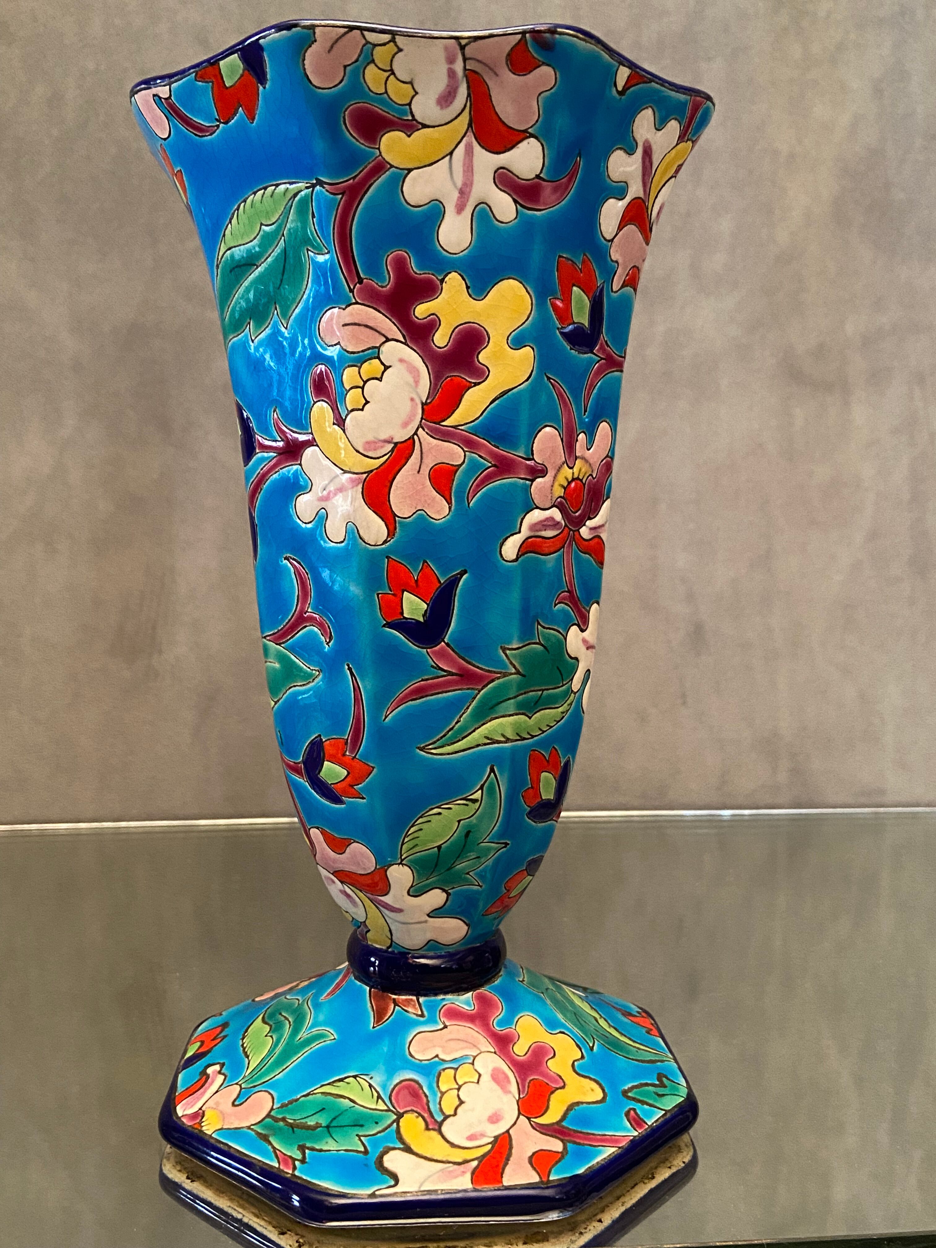 Faience cornet vase with floral decoration signed Emaux de Longwy