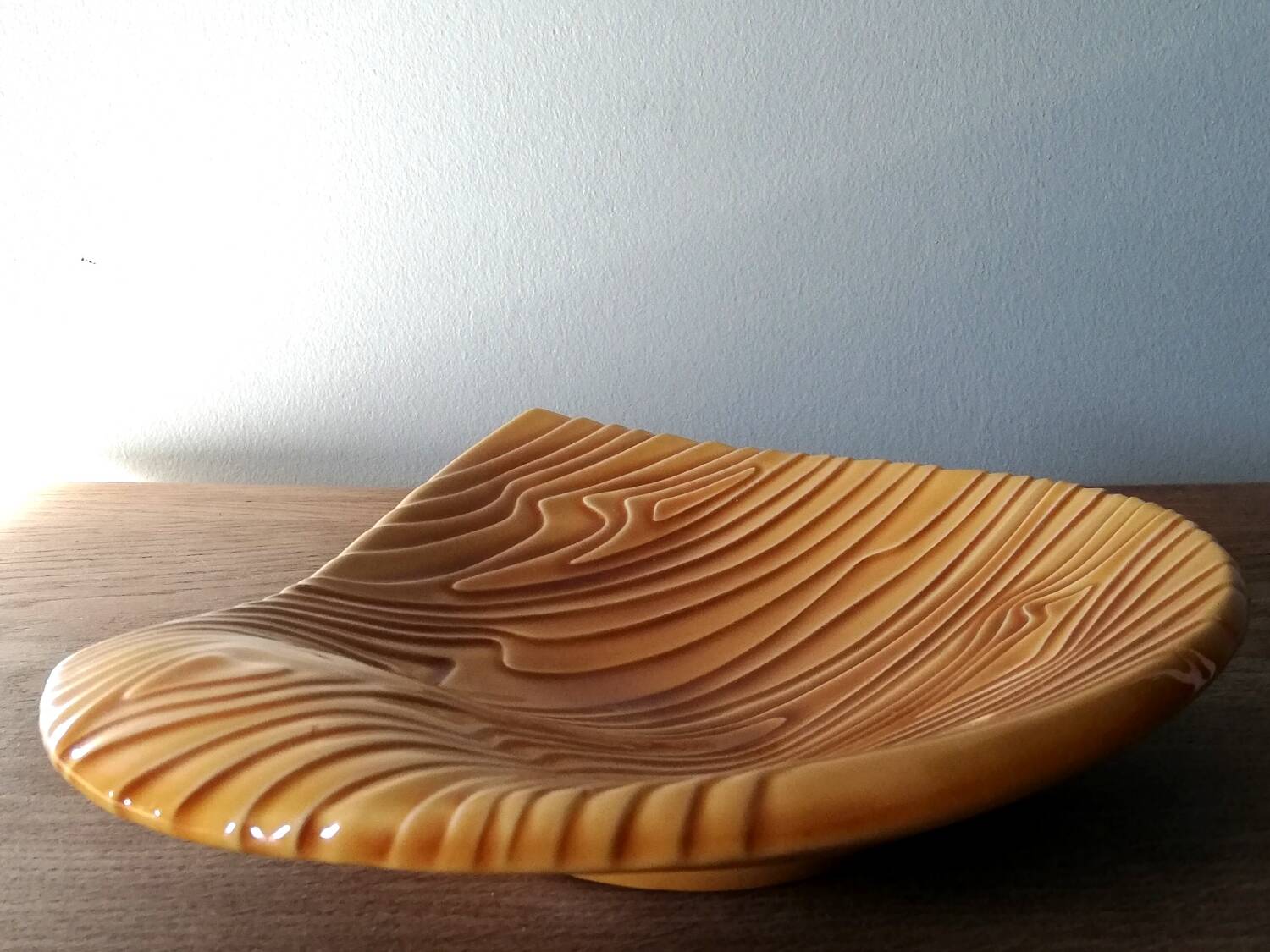 Ceramic pocket emptier