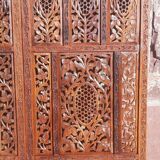 Carved solid wood screen.