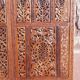 Carved solid wood screen.