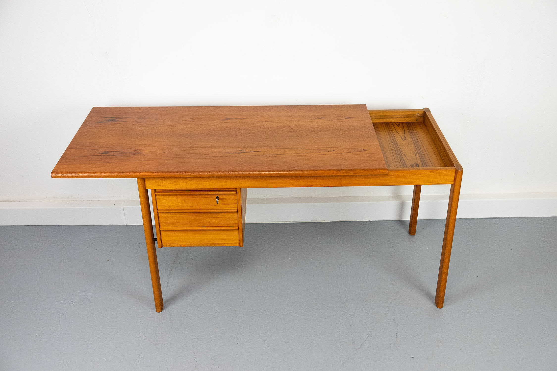 Teak Desk with movable table top by Løvig, 1960s