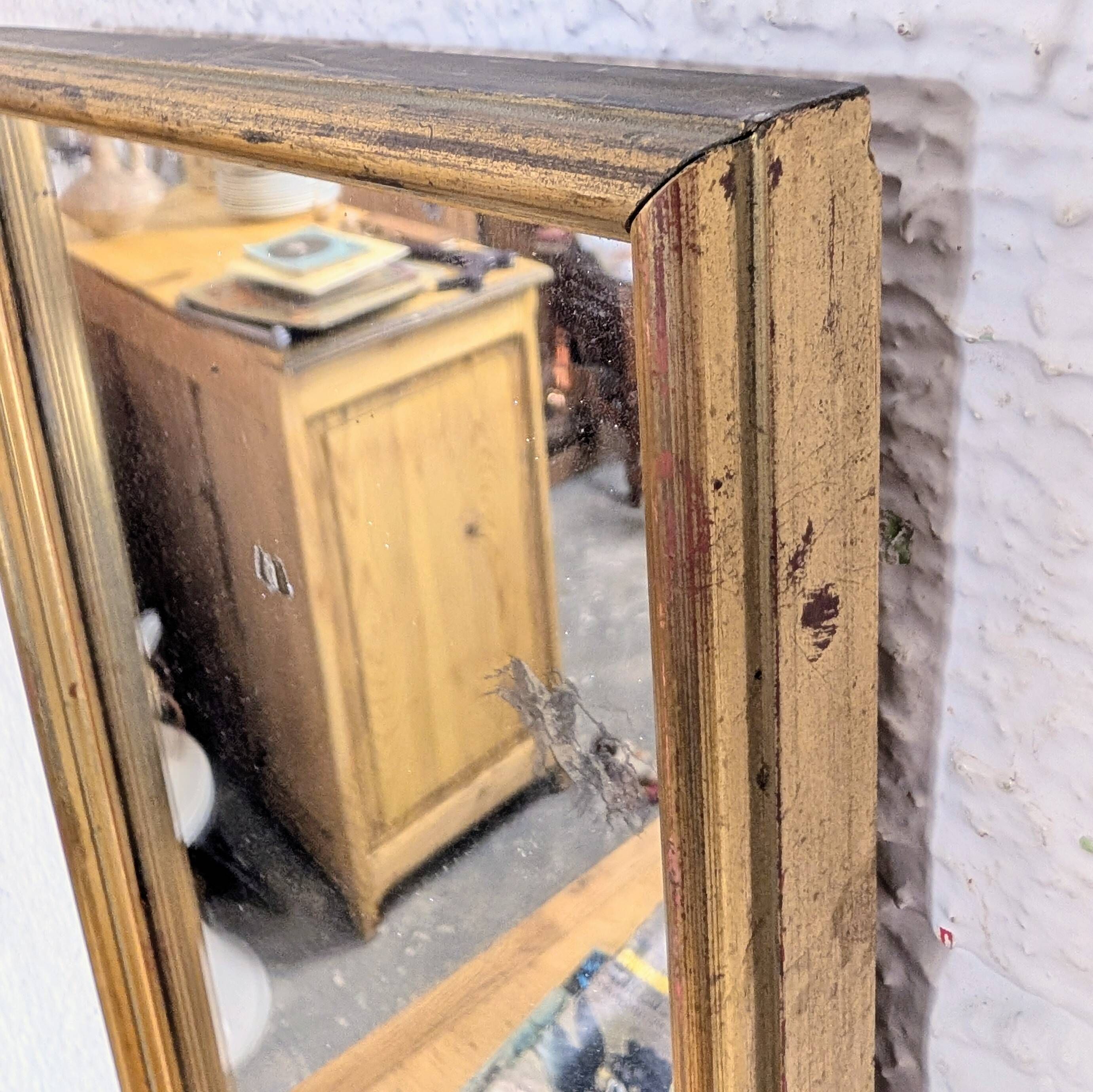 Miroir ancien doré à la feuille glace piquée