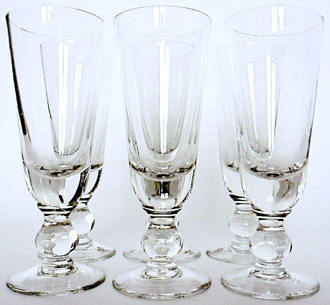 Suite of six former crystal champagne flutes
