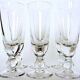 Suite of six former crystal champagne flutes