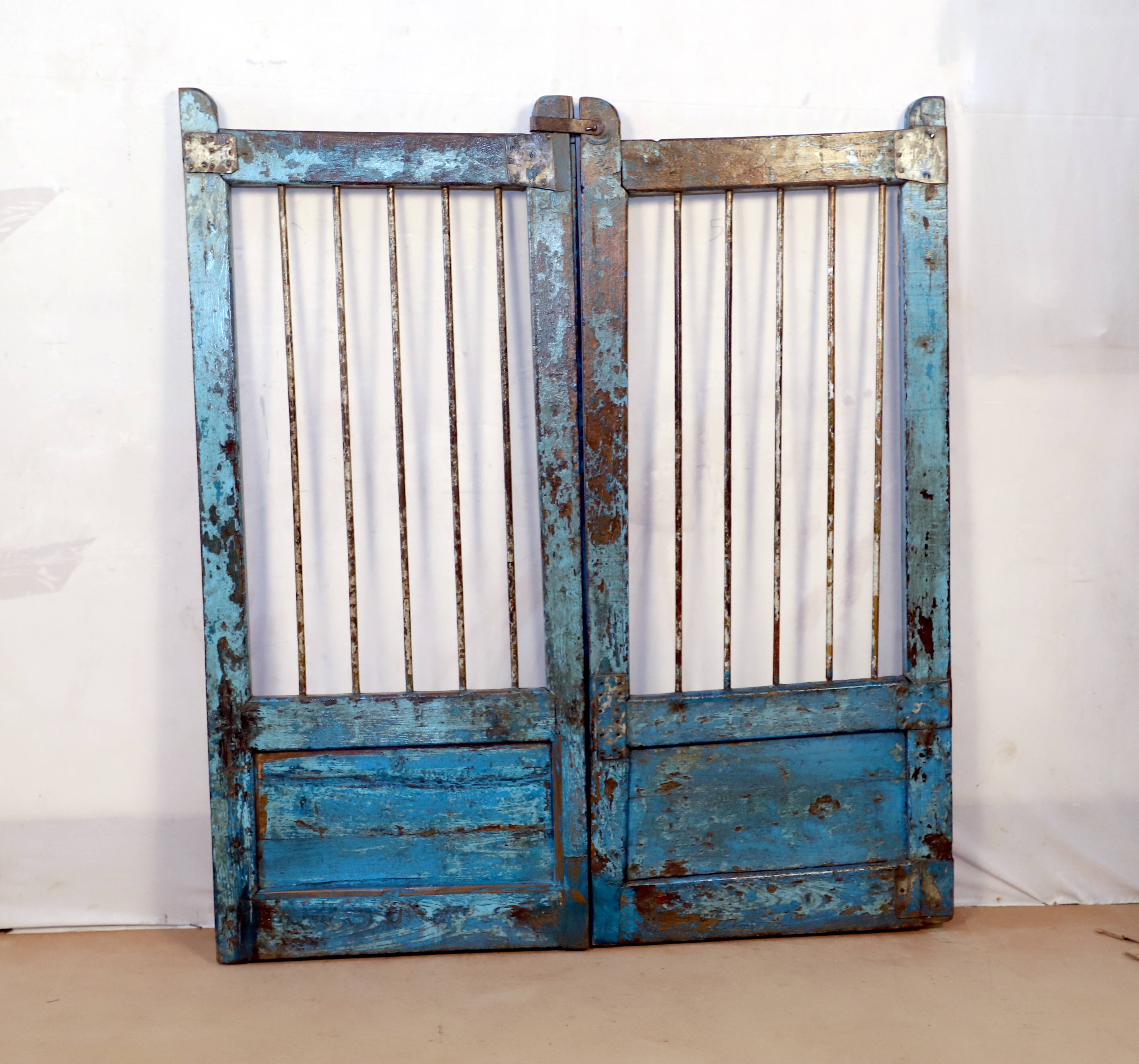 Old burmese teak gate with openwork wrought iron panels