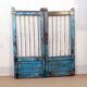 Old burmese teak gate with openwork wrought iron panels