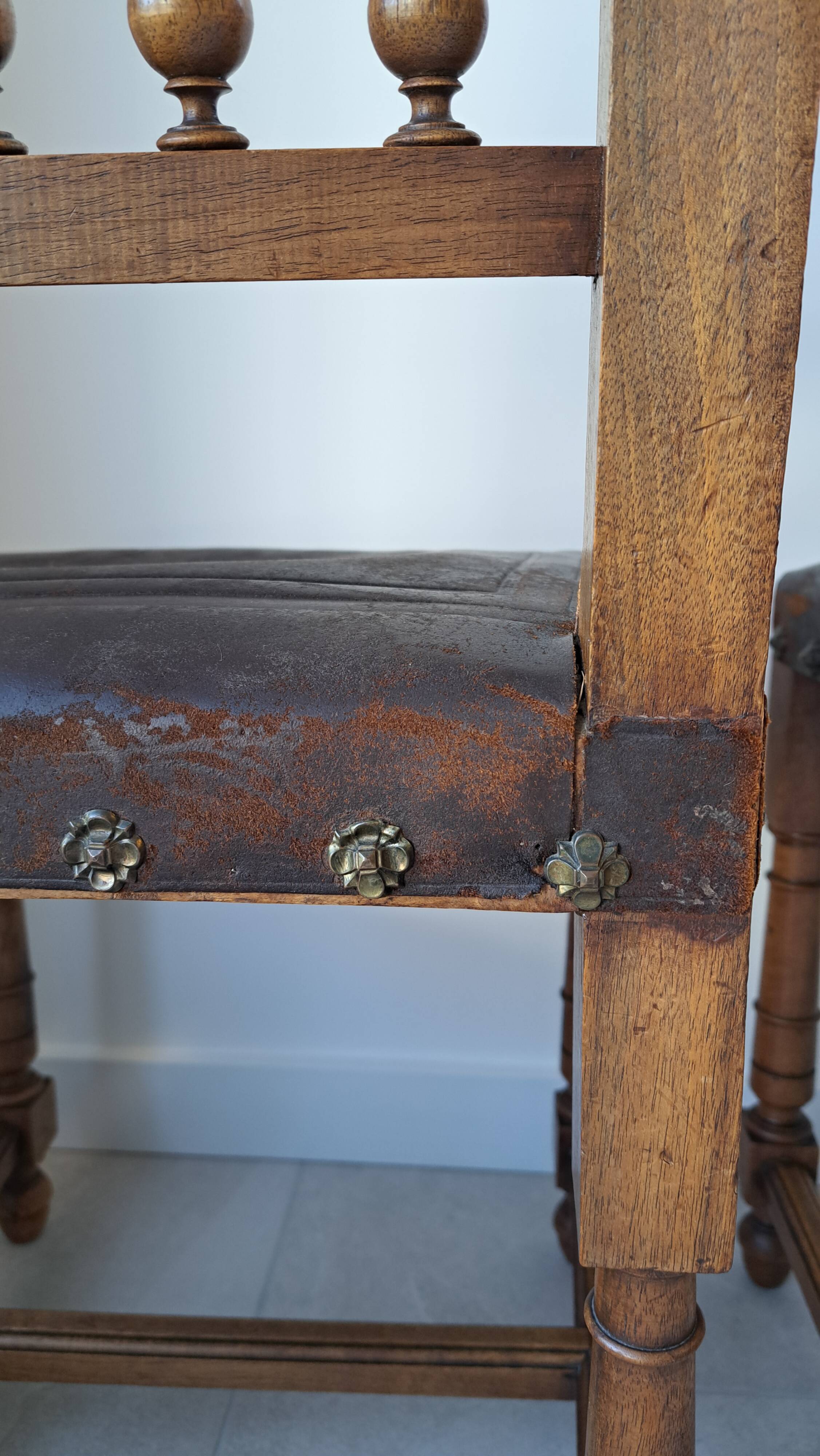 Pair of antique chairs in embossed leather, Henri II style.