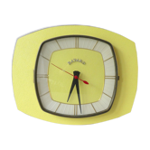 Pendule, Bayard wall clock in yellow formica from the 60s