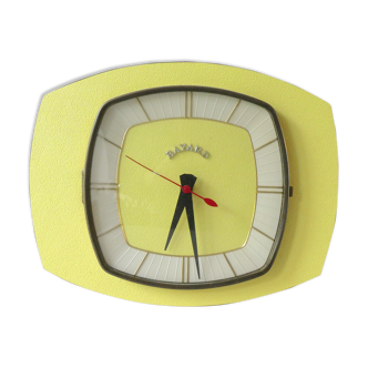 Pendule, Bayard wall clock in yellow formica from the 60s