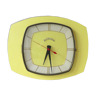 Pendule, Bayard wall clock in yellow formica from the 60s