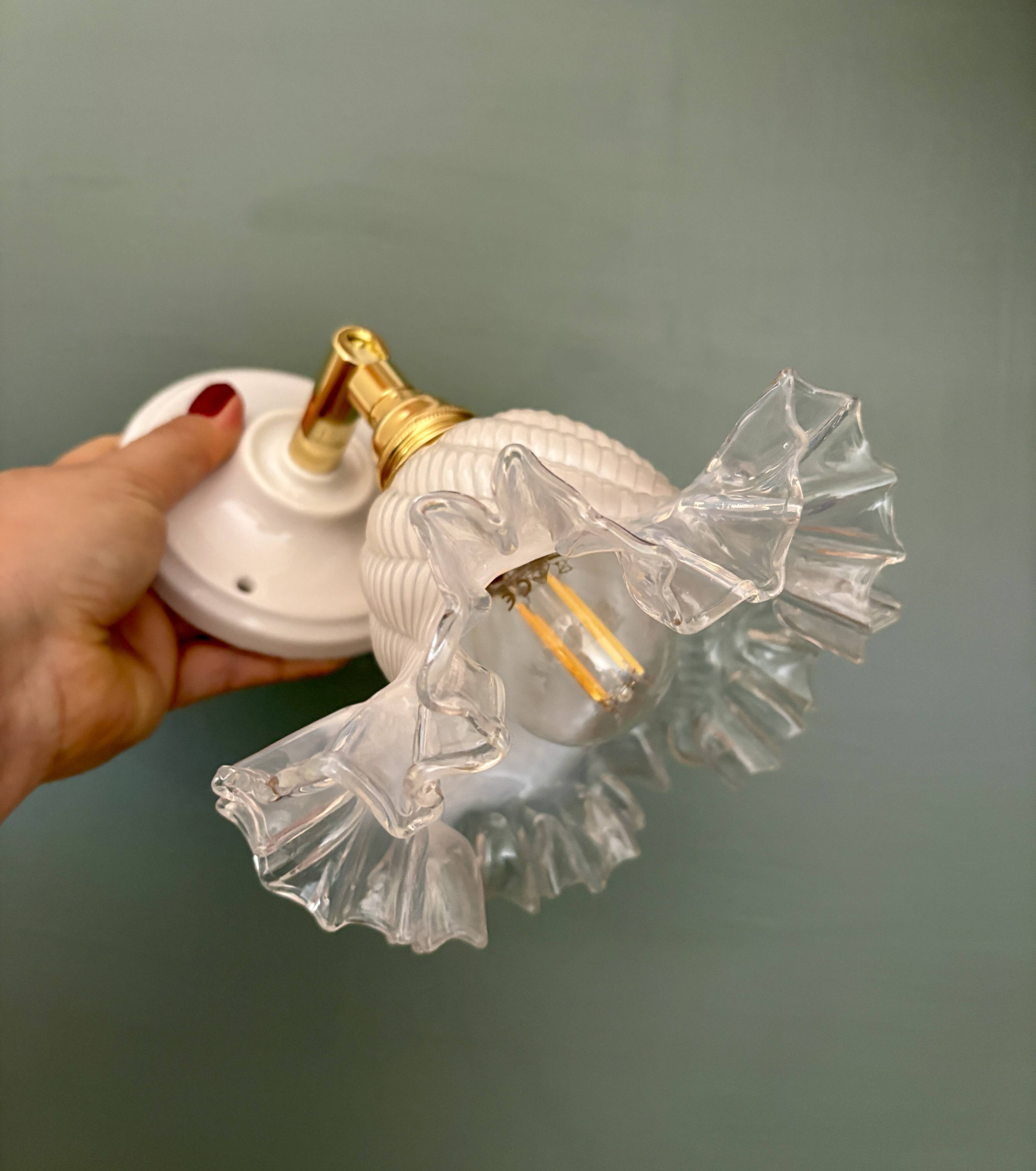 Vintage tulip glass wall light in transparent, slightly pearlescent white.