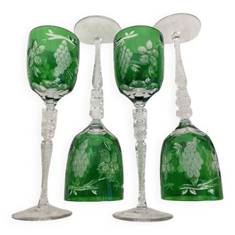 Set of 4 crystal glasses.