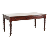 Antique English writing desk from the late 19th century with a warm colour
