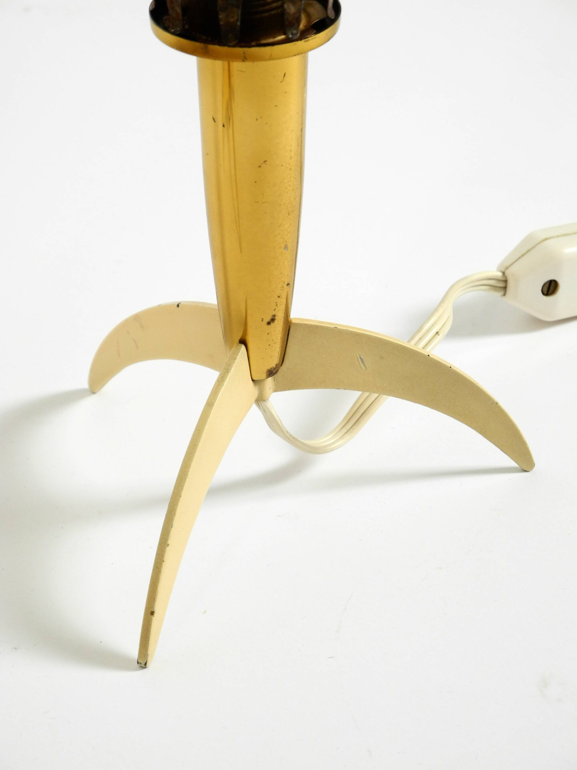 Two Mid-Century Modern rocket table lamps in brass and glass