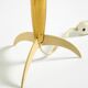 Two Mid-Century Modern rocket table lamps in brass and glass
