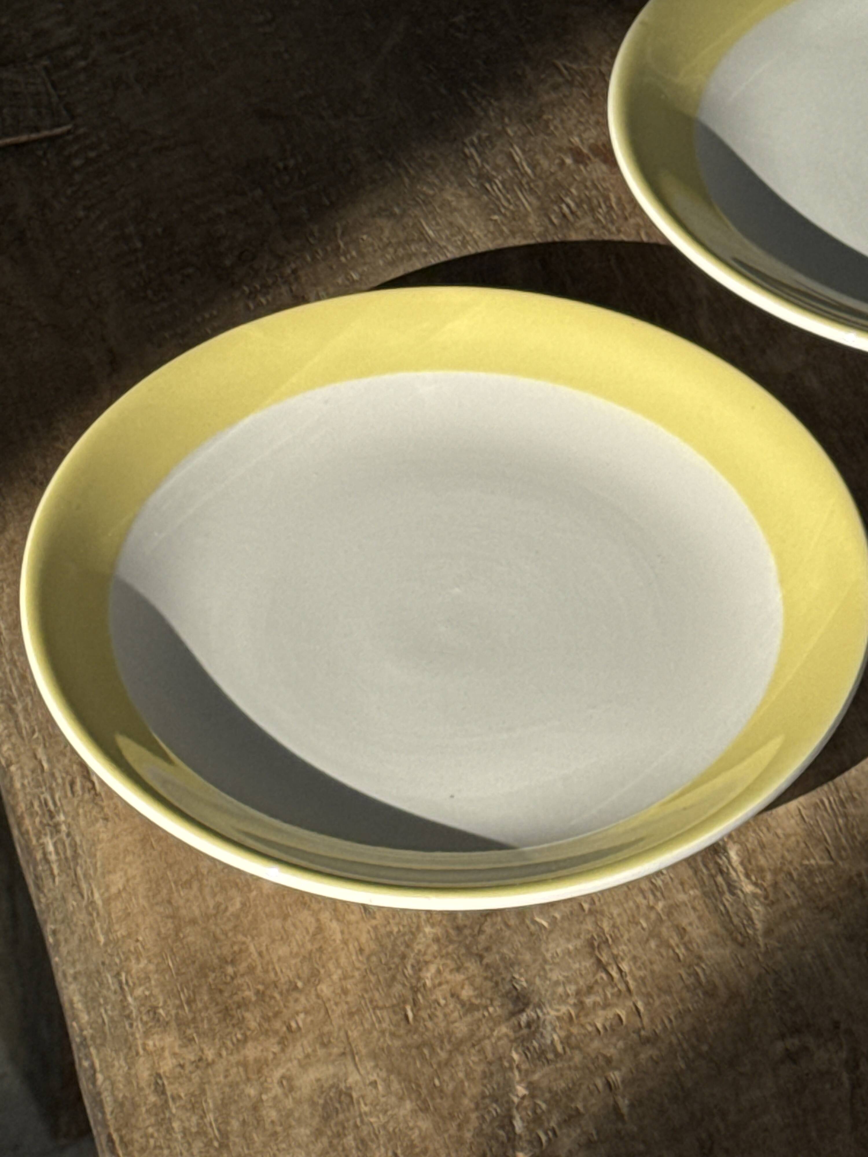 Set of 2 large plates with yellow rim, brand 12.