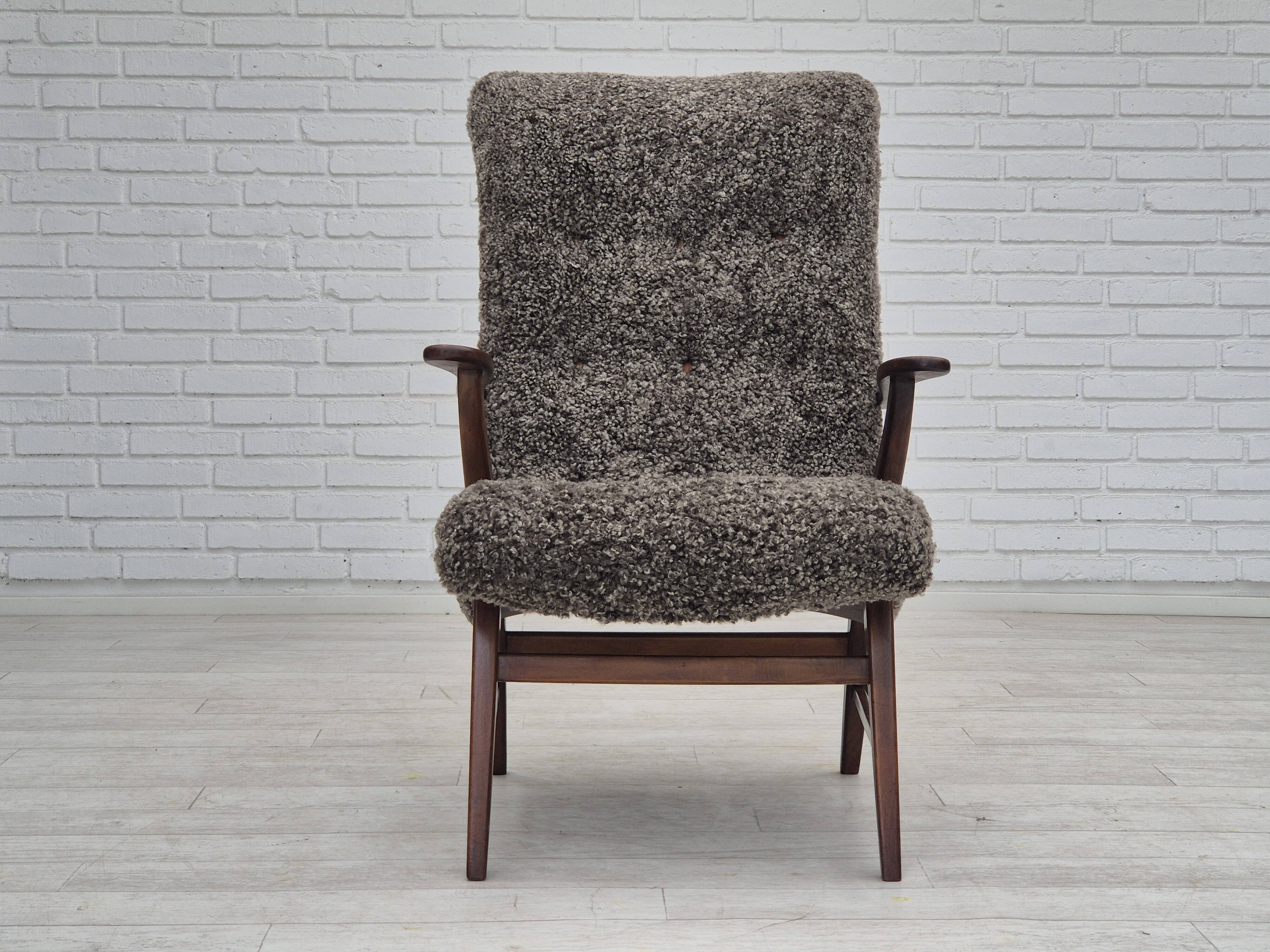 60s, Danish design, refurbished armchair, genuine sheepskin "Wellington".