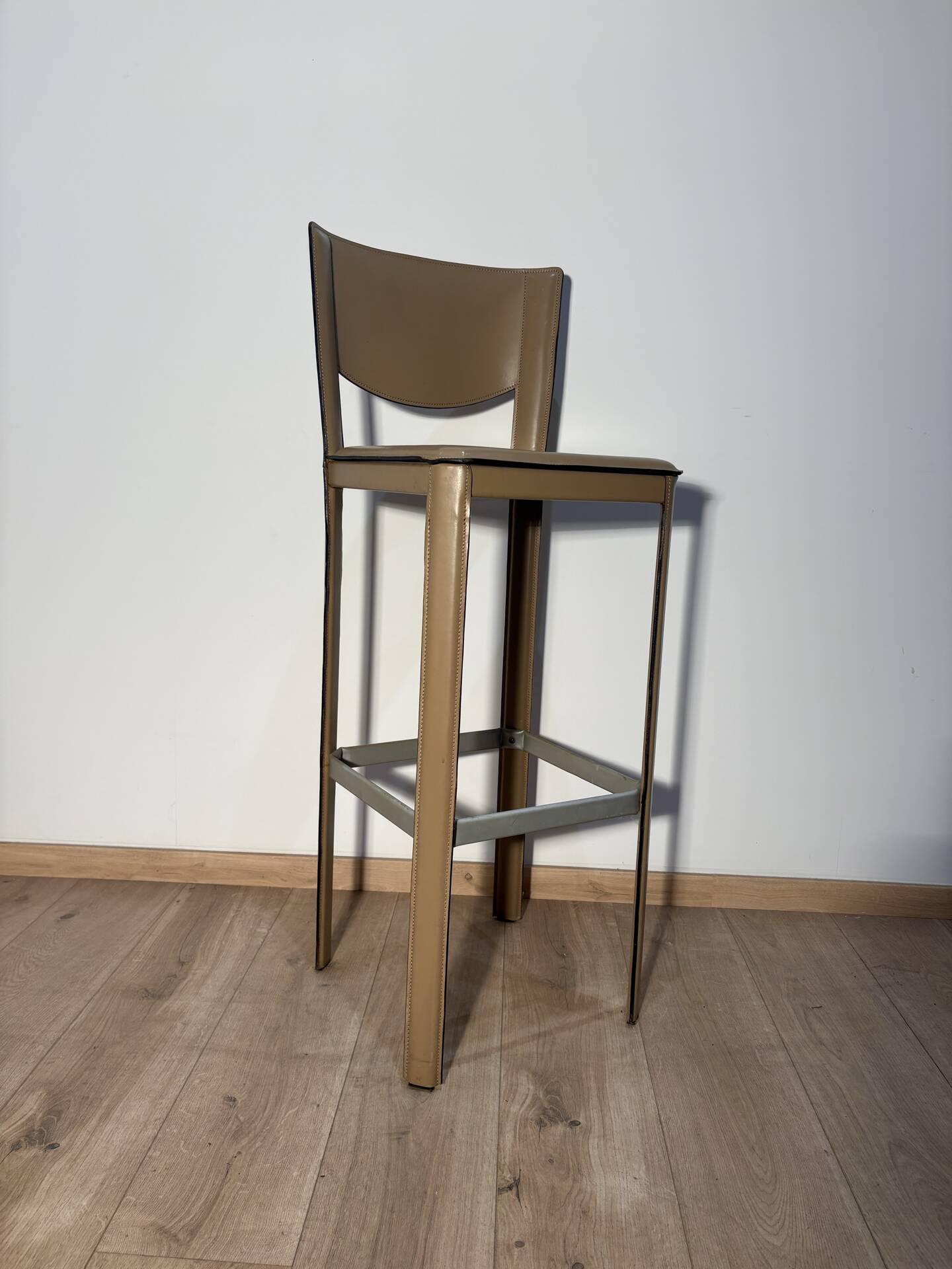 Pair of leather stools Enrico Pellizoni