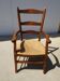 Ancien fauteuil en bois et paille