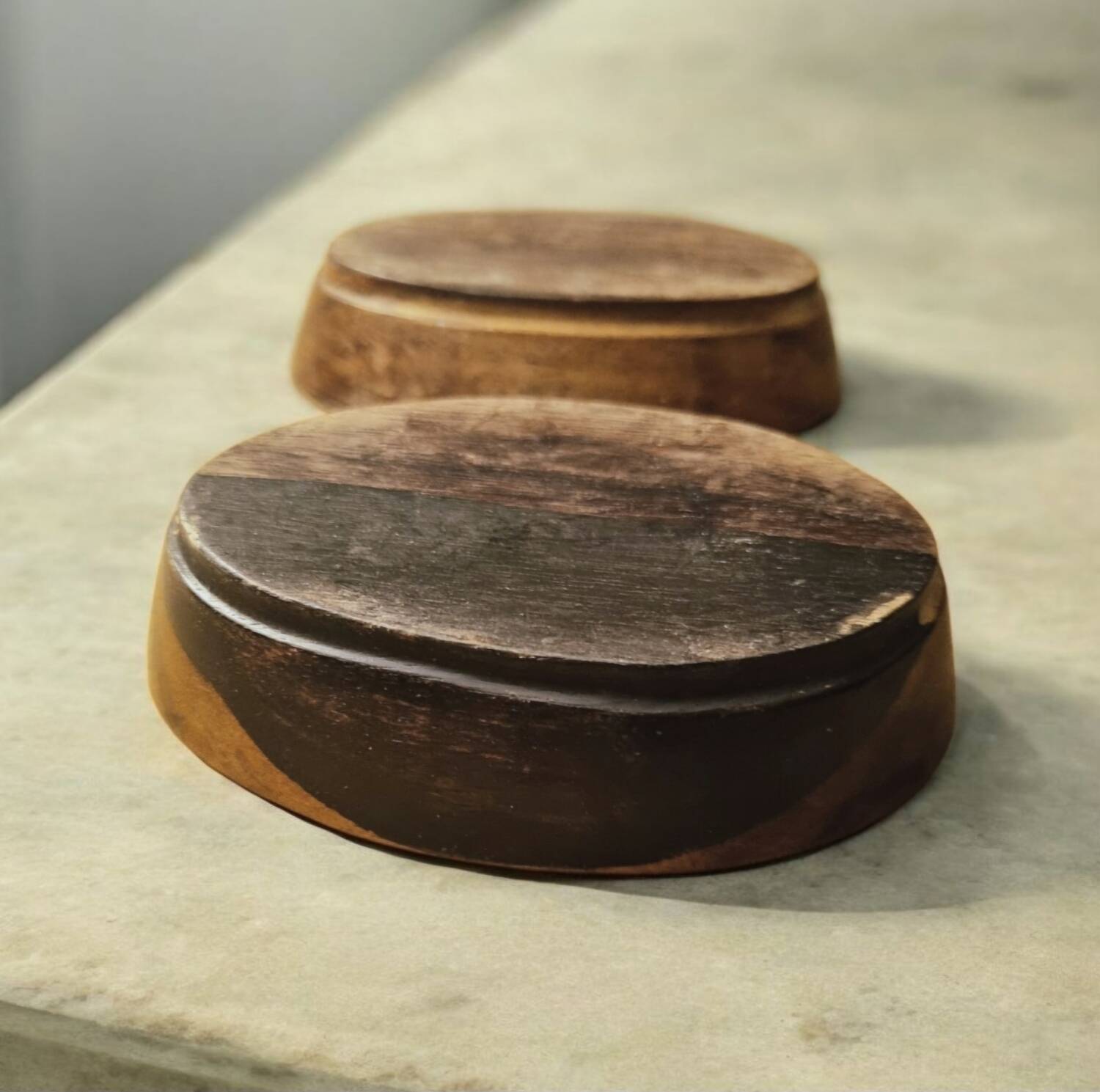 Pair of pocket emptiers or soap dishes